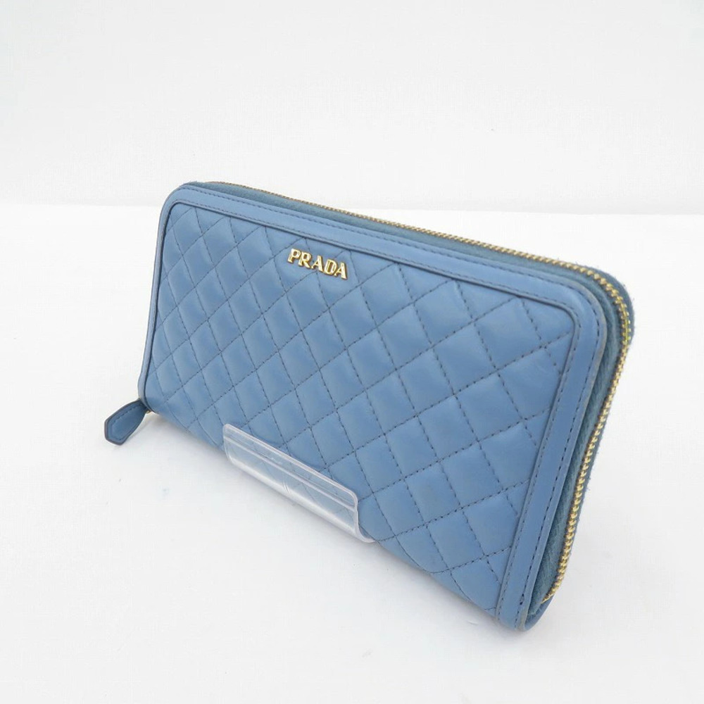Prada Soft Calf Leather Quilted Round Zip Long Wallet Blue